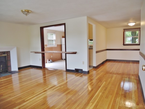 191 Hardy Pond Road Waltham, MA 02451 - Photo 3 of 16 an empty room with wooden floor and entrance