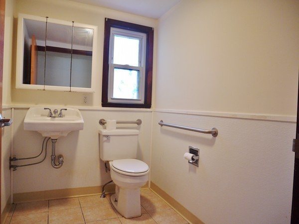 191 Hardy Pond Road Waltham, MA 02451 - Photo 10 of 16 a bathroom with a toilet sink and mirror
