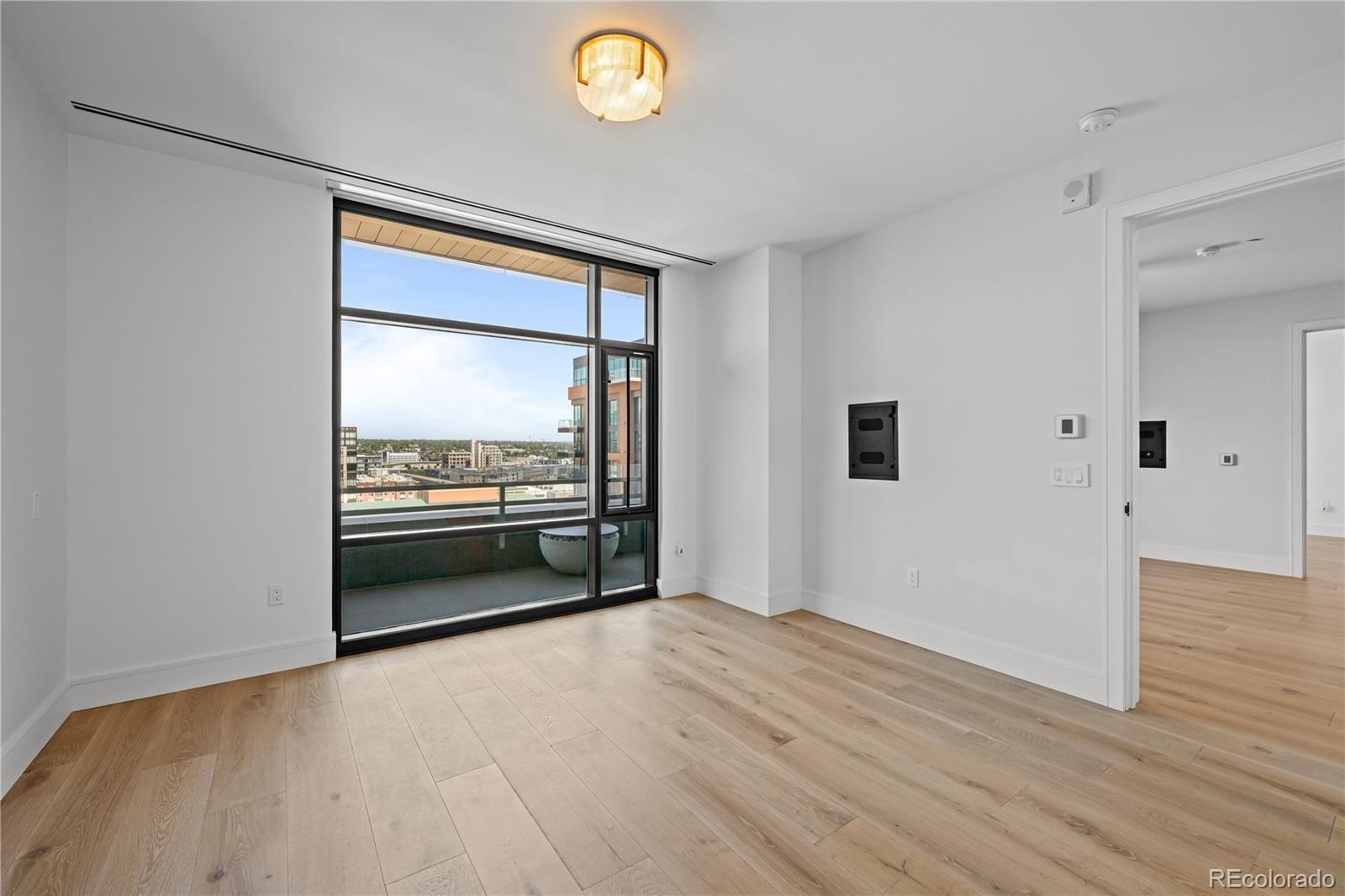 1901 Wazee Street, Unit 1110 Denver, CO 80202 - Photo 14 of 36 a view of a livingroom with wooden floor