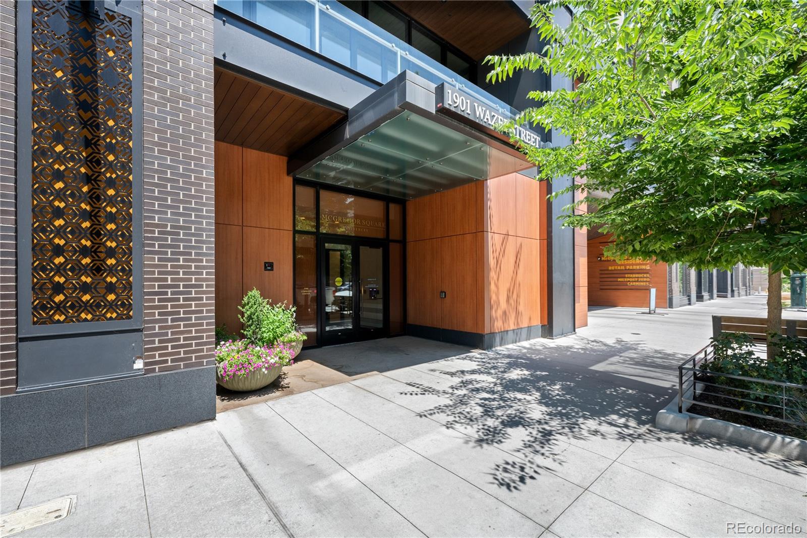 1901 Wazee Street, Unit 1110 Denver, CO 80202 - Photo 35 of 36 a front view of a house with a yard