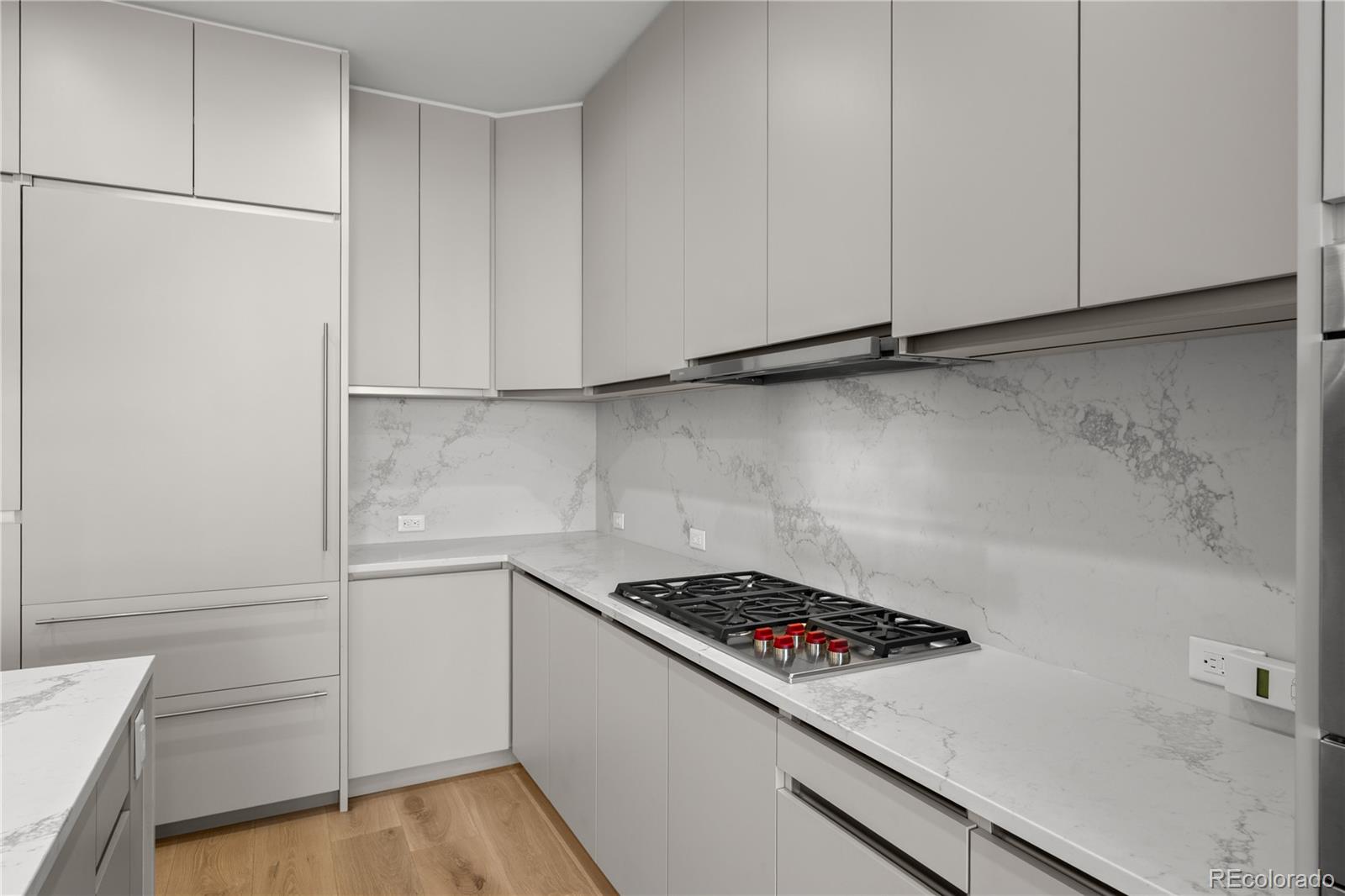 1901 Wazee Street, Unit 1110 Denver, CO 80202 - Photo 7 of 36 a kitchen with a sink and cabinets