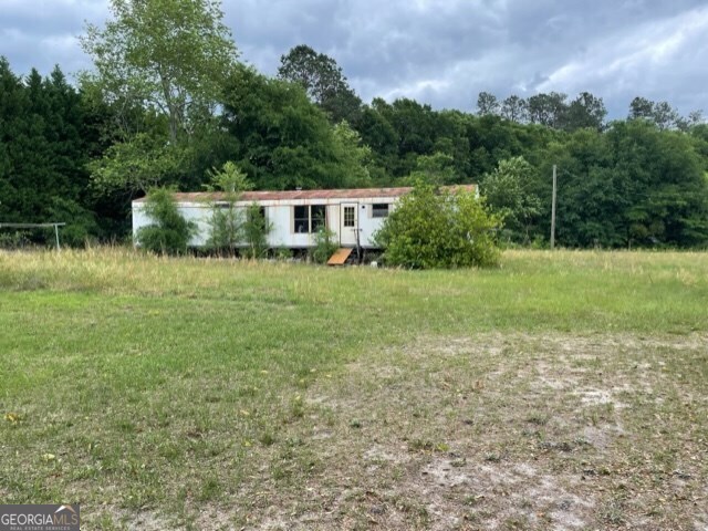930 Horseshoe Road Augusta, GA 30906 - Photo 1 of 1 a view of a house with a big yard