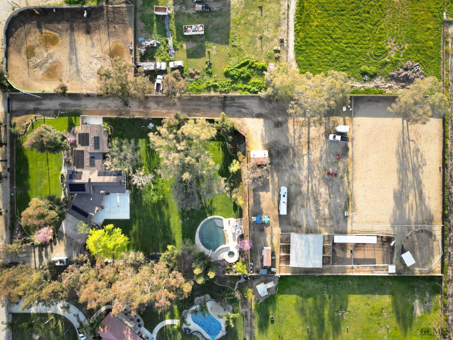 Undisclosed Address Bakersfield, CA 93314 - Photo 4 of 52 a aerial view of a house with a lake view