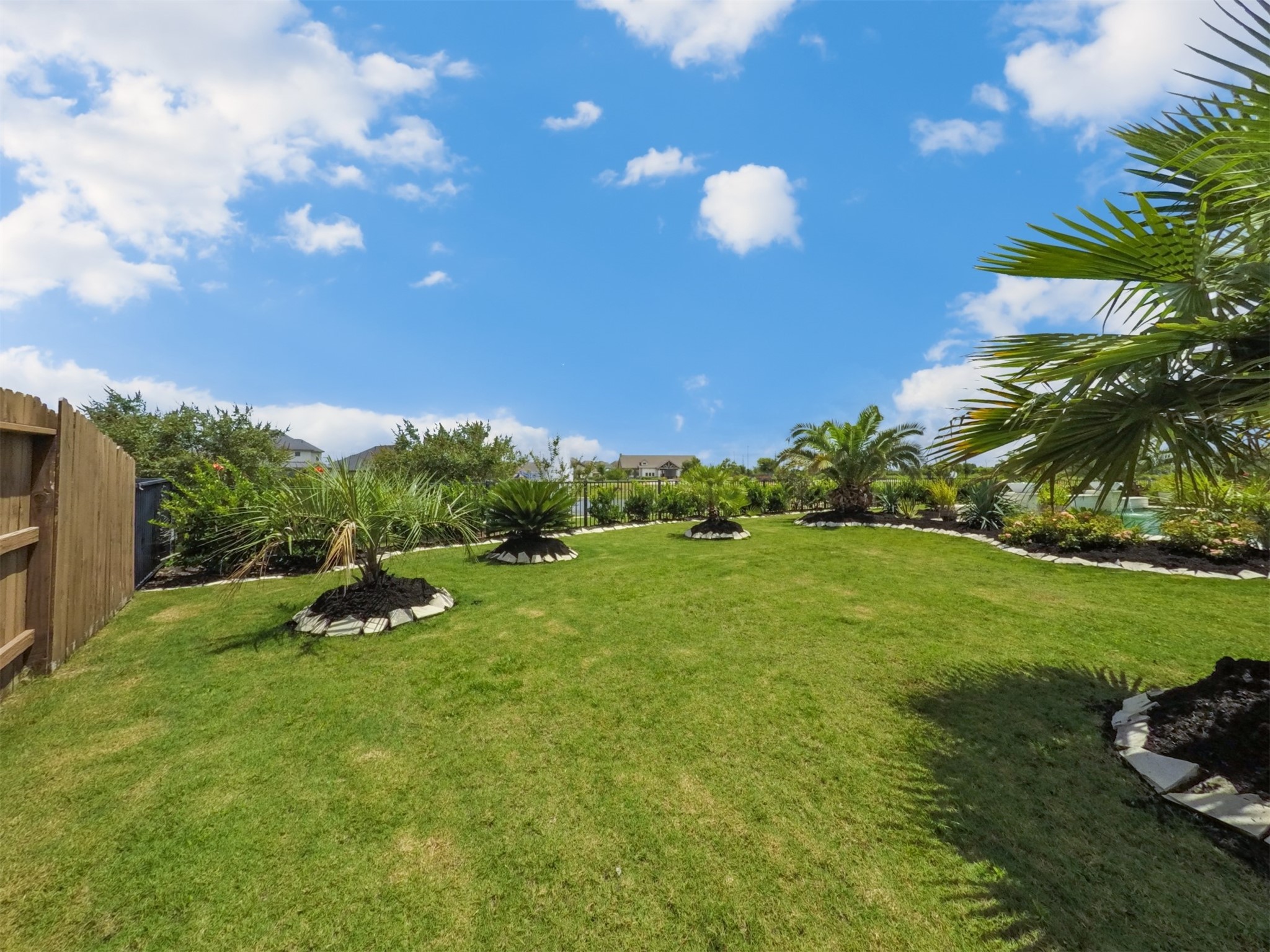 4343 Martin Ridge Drive Manvel, TX 77578 - Photo 47 of 50 a view of a golf course with a lake