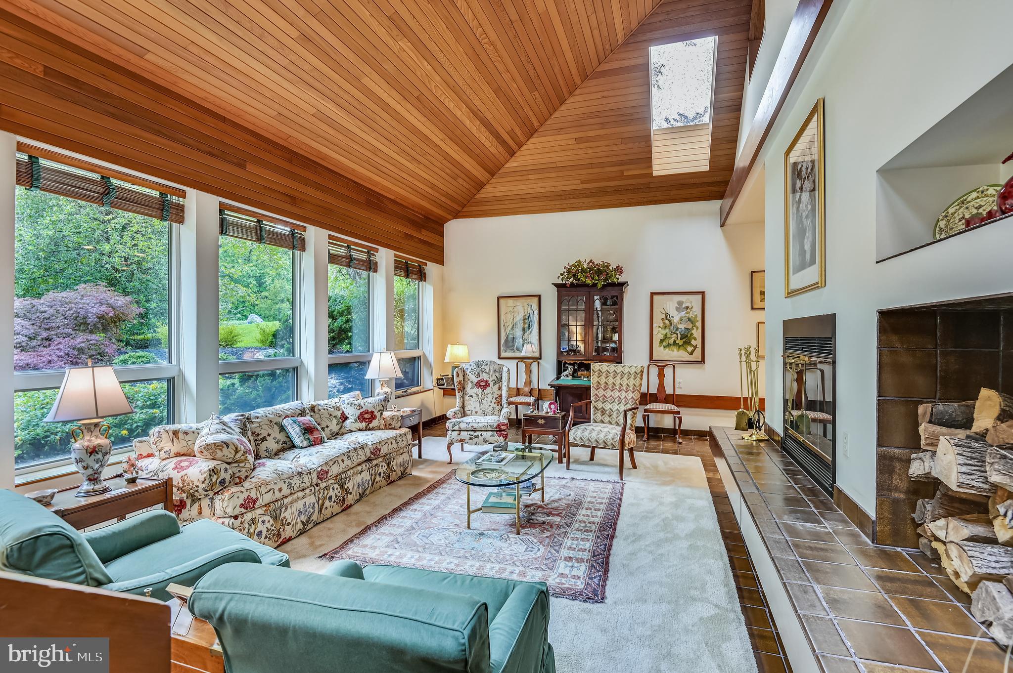 914 Rolandvue Road Baltimore, MD 21204 - Photo 21 of 45 Living Rm w/ vaulted ceiling and wall of glass