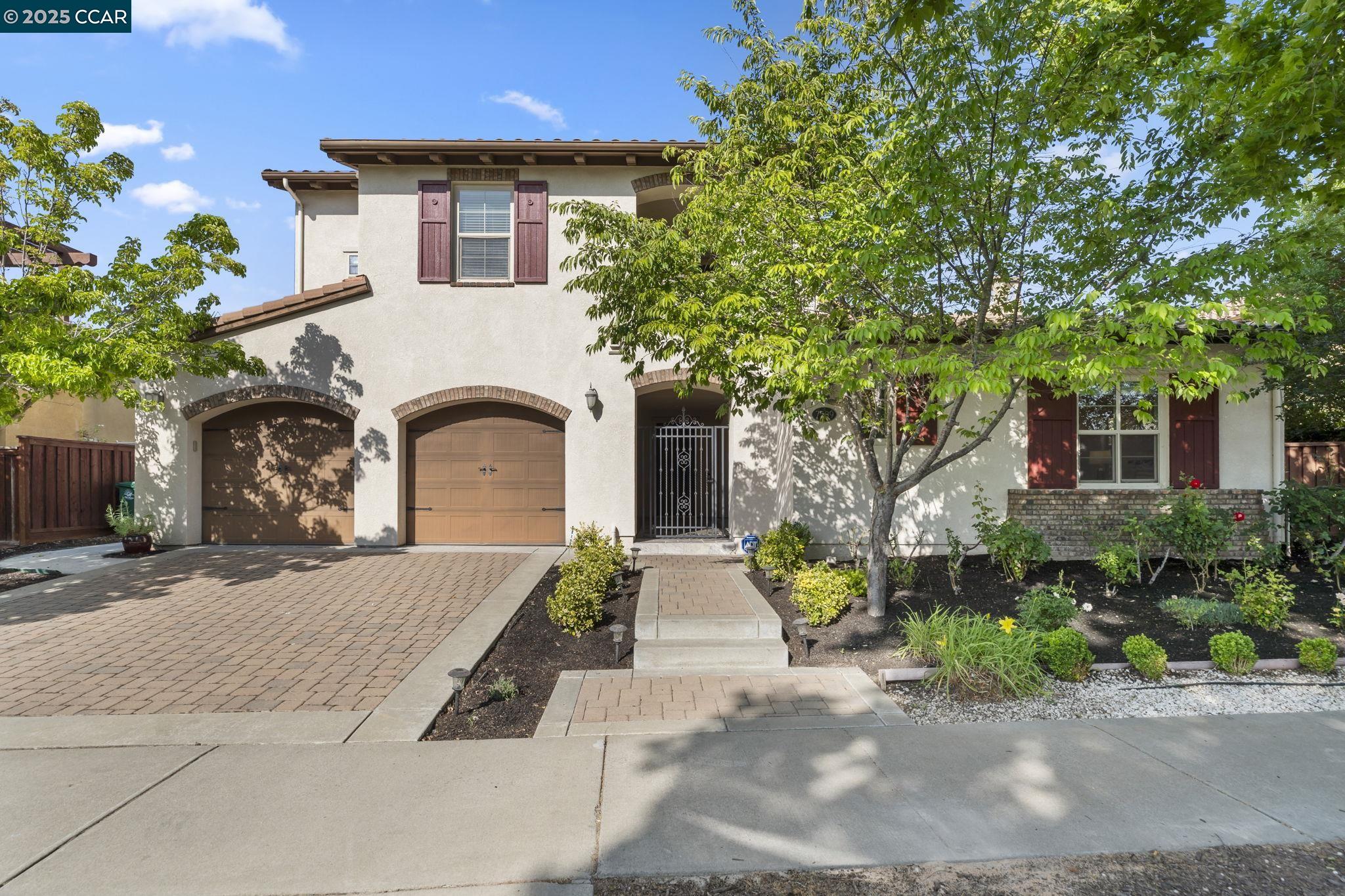 7509 Balmoral Way San Ramon, CA 94582 - Photo 1 of 1 a front view of a house with garden