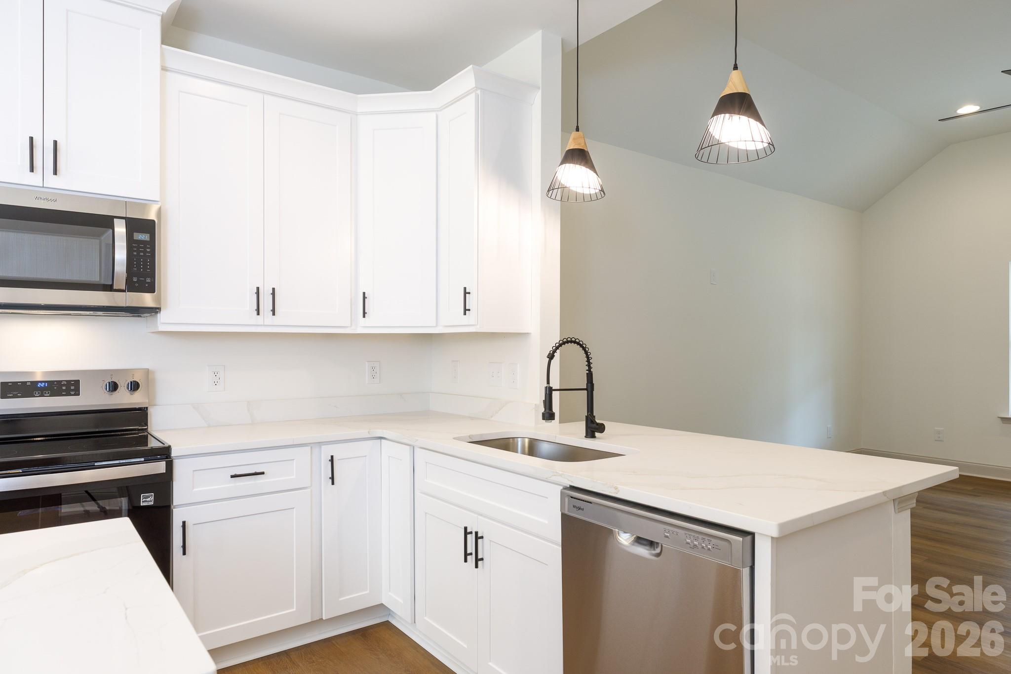 107 Brown Street, Unit 12 Clover, SC 29710 - Photo 11 of 33 a kitchen with a sink and cabinets