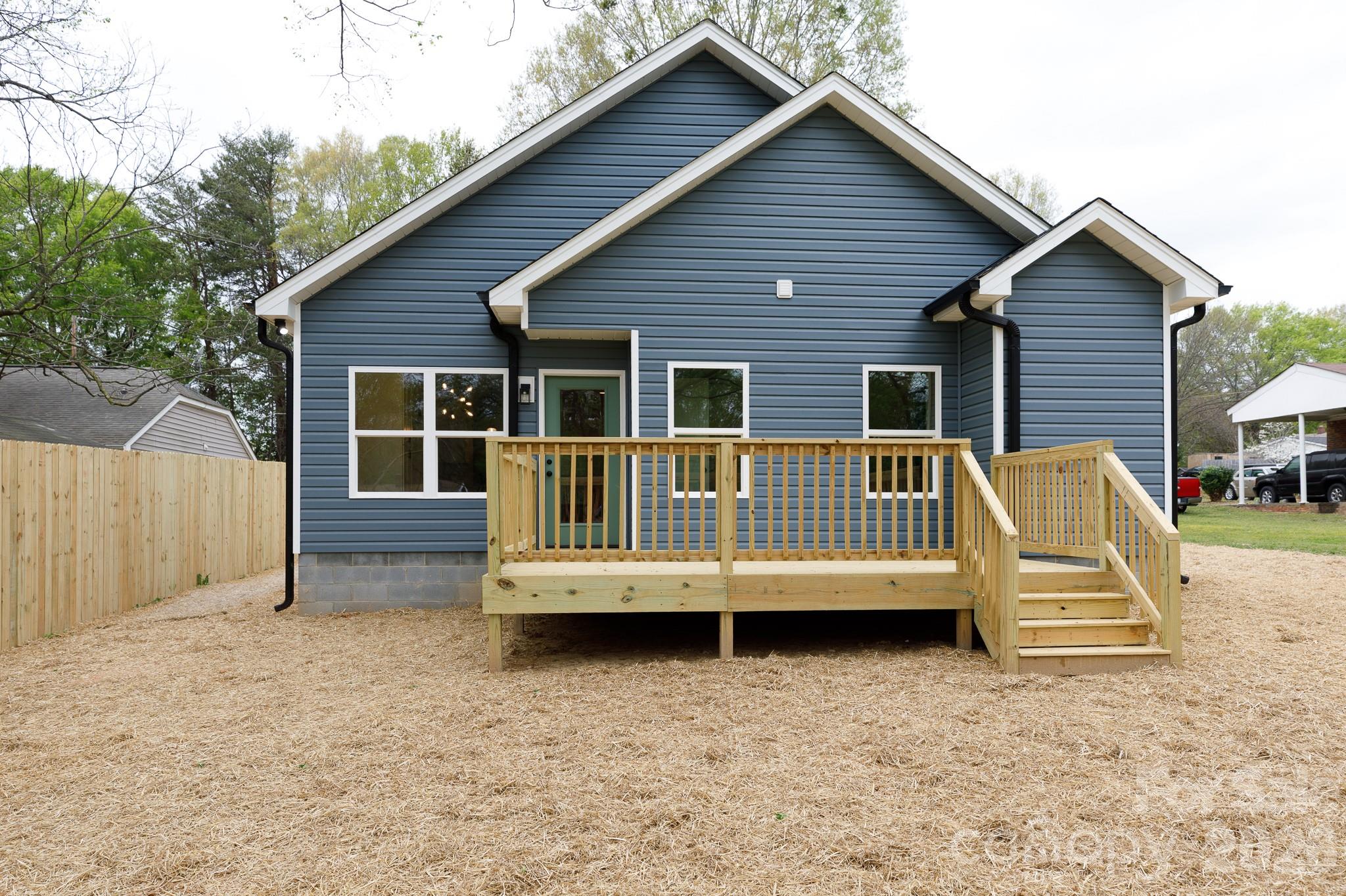107 Brown Street, Unit 12 Clover, SC 29710 - Photo 18 of 33 a view of a house with a yard and deck