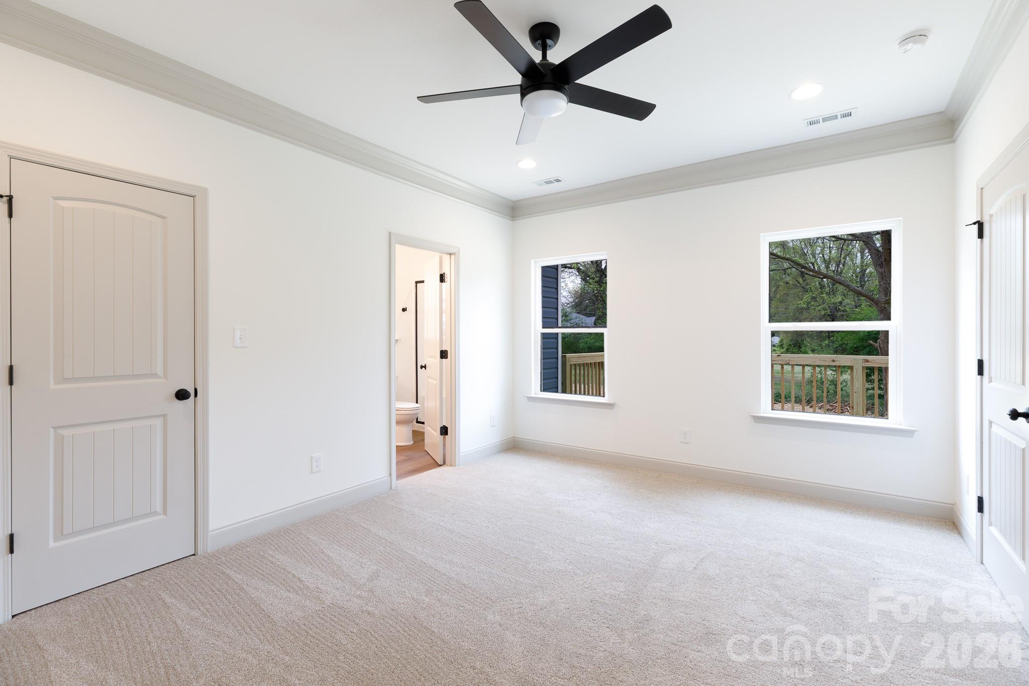107 Brown Street, Unit 12 Clover, SC 29710 - Photo 20 of 33 a view of a livingroom with a window and a ceiling fan
