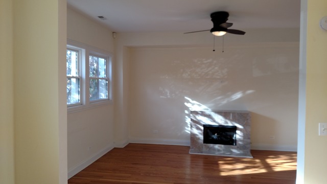 1542 West Sherwin Avenue, Unit GS Chicago, IL 60626 - Photo 5 of 11 a view of entryway and hall with wooden floor