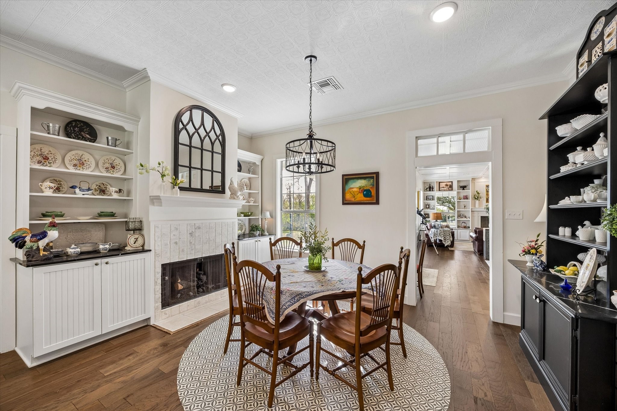 10222 Old Stagecoach Road Chappell Hill, TX 77426 - Photo 11 of 42 a dining room with furniture and wooden floor