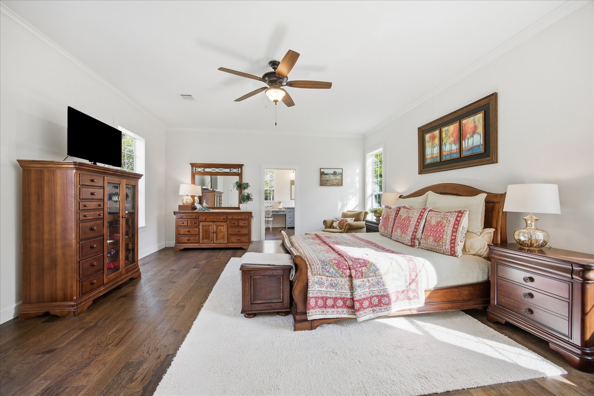 10222 Old Stagecoach Road Chappell Hill, TX 77426 - Photo 17 of 42 a spacious bedroom with a bed and a tv