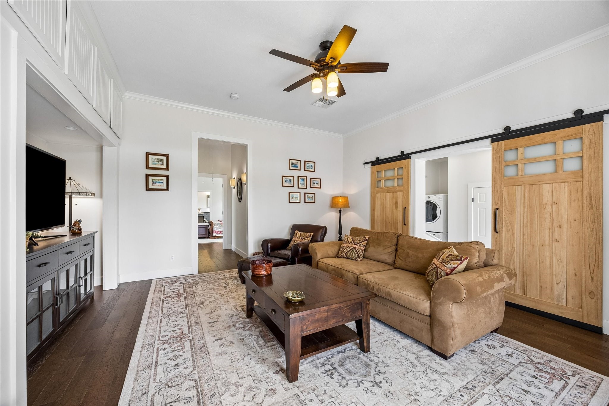 10222 Old Stagecoach Road Chappell Hill, TX 77426 - Photo 20 of 42 a living room with furniture and a flat screen tv