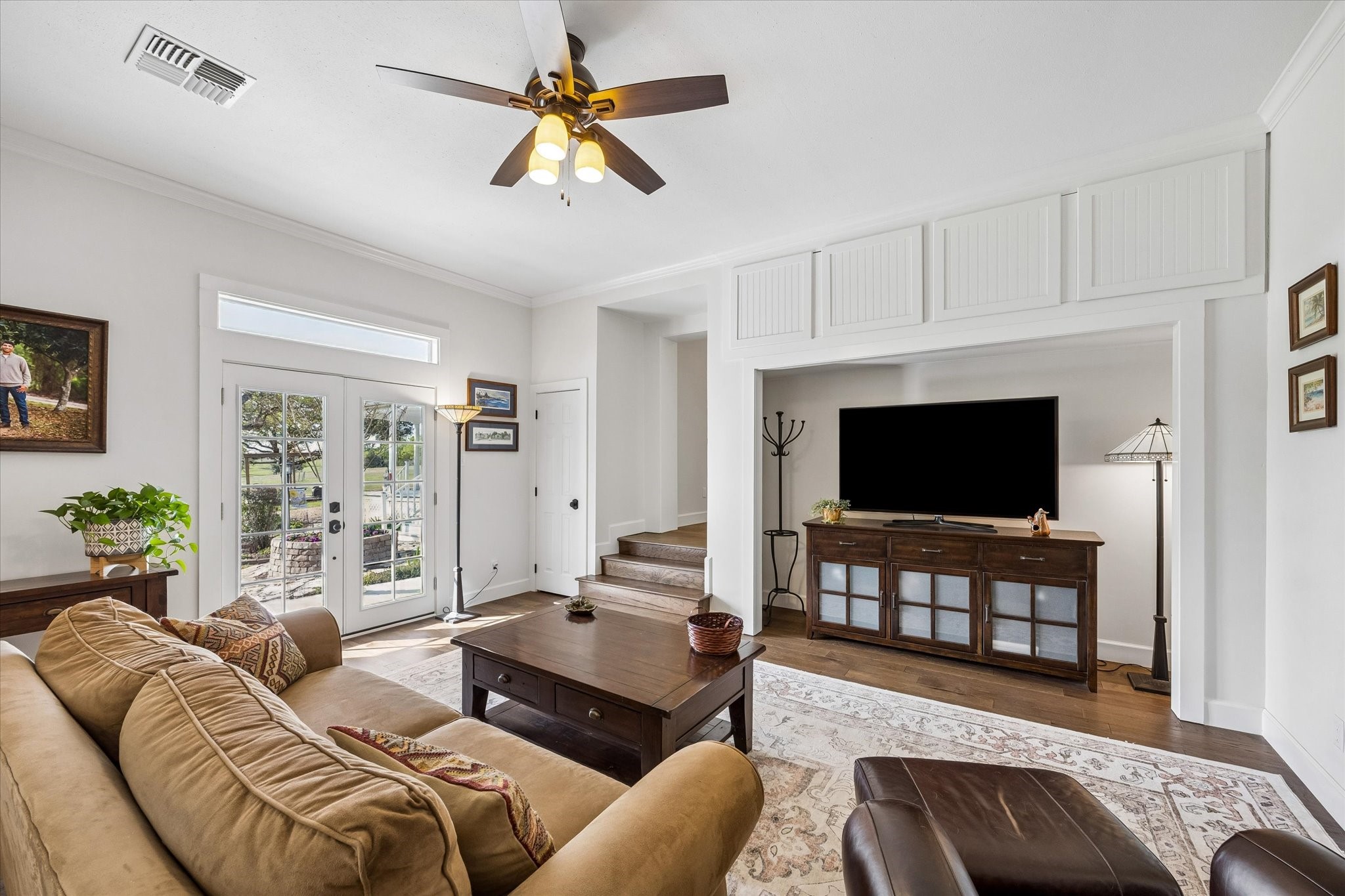 10222 Old Stagecoach Road Chappell Hill, TX 77426 - Photo 22 of 42 a living room with furniture and a flat screen tv