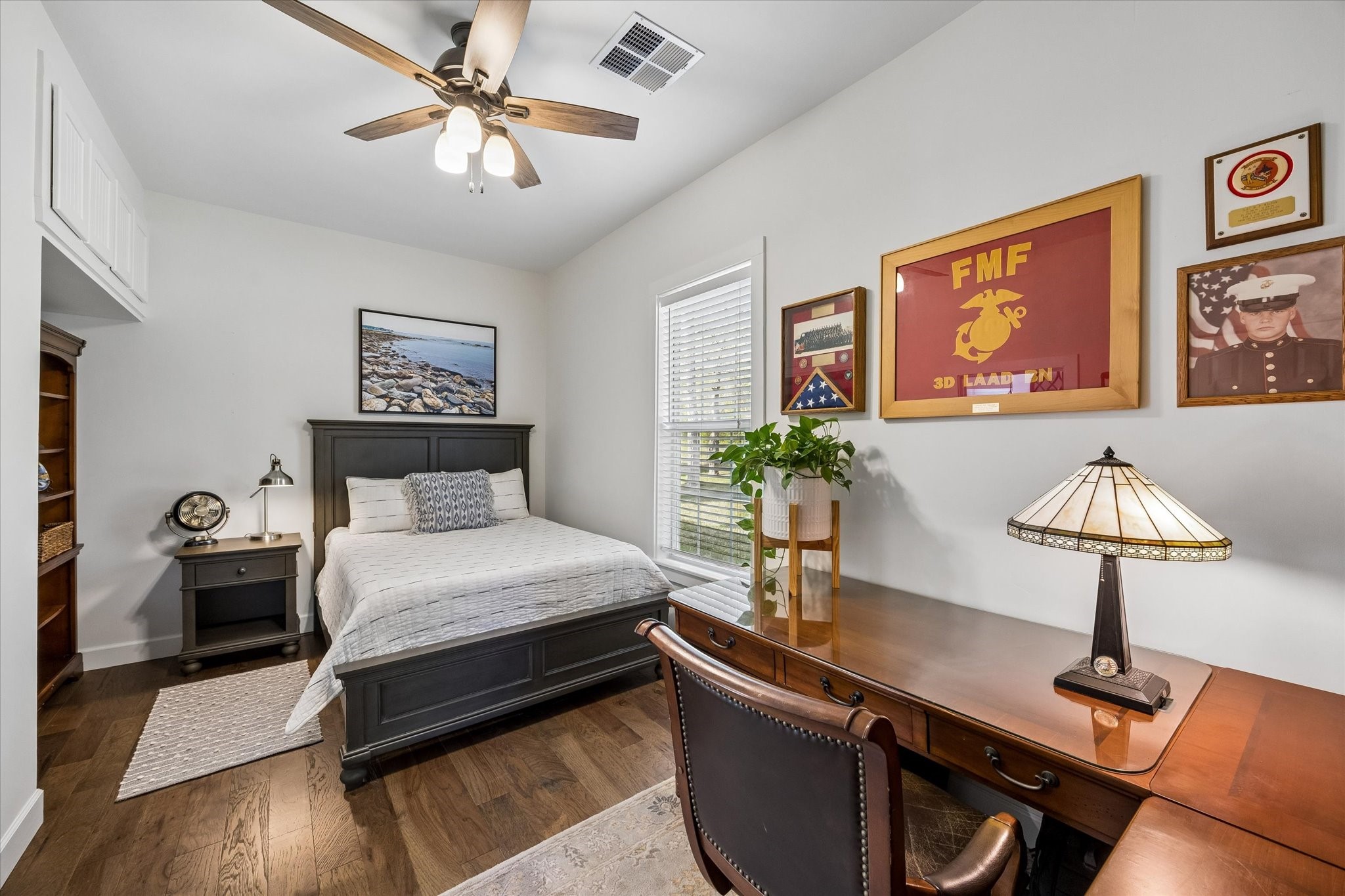 10222 Old Stagecoach Road Chappell Hill, TX 77426 - Photo 23 of 42 a bedroom with a bed and a table