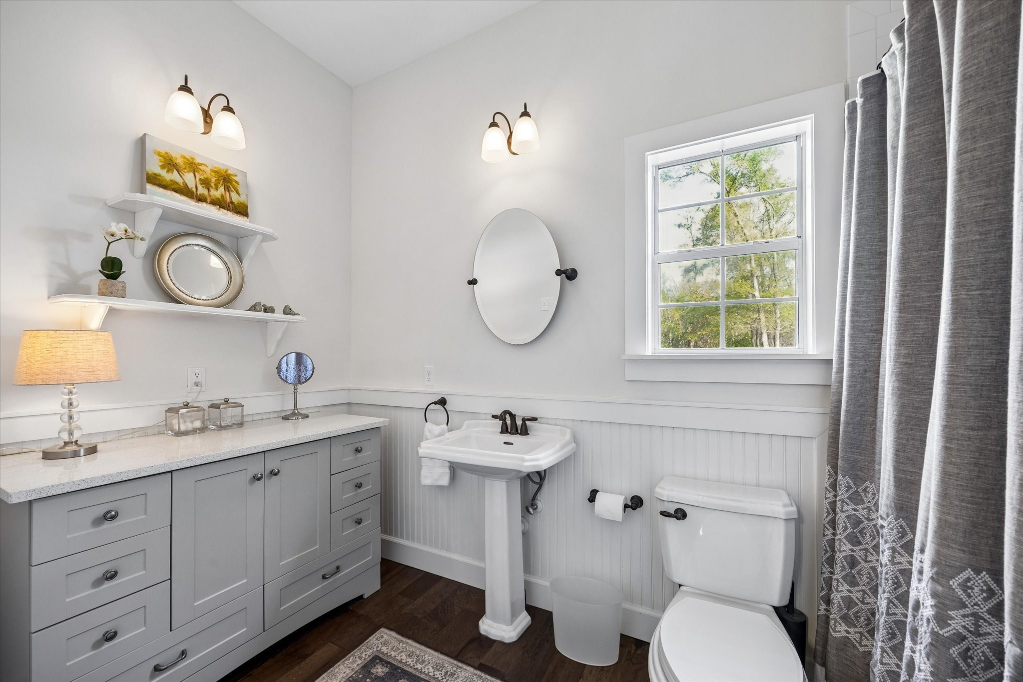 10222 Old Stagecoach Road Chappell Hill, TX 77426 - Photo 24 of 42 a bathroom with a toilet sink and mirror