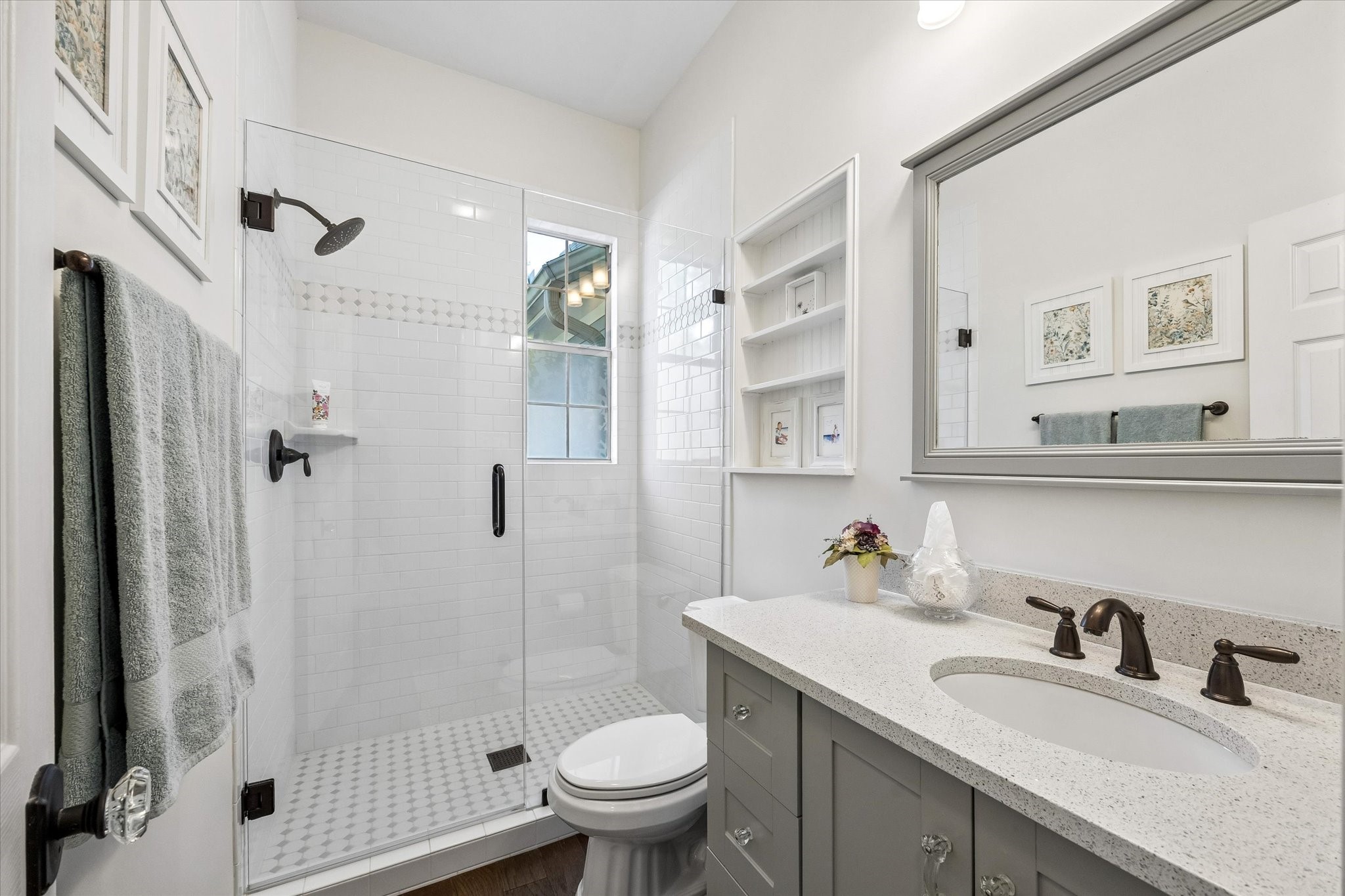 10222 Old Stagecoach Road Chappell Hill, TX 77426 - Photo 27 of 42 a bathroom with a sink toilet and shower