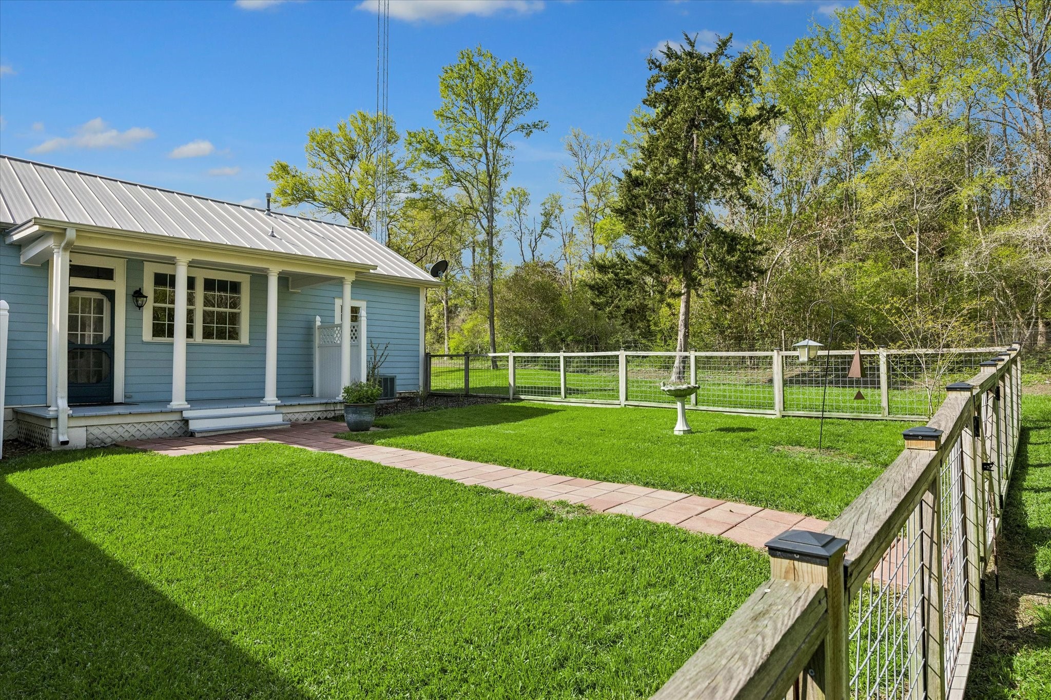 10222 Old Stagecoach Road Chappell Hill, TX 77426 - Photo 38 of 42 a view of a house with a big yard and potted plants