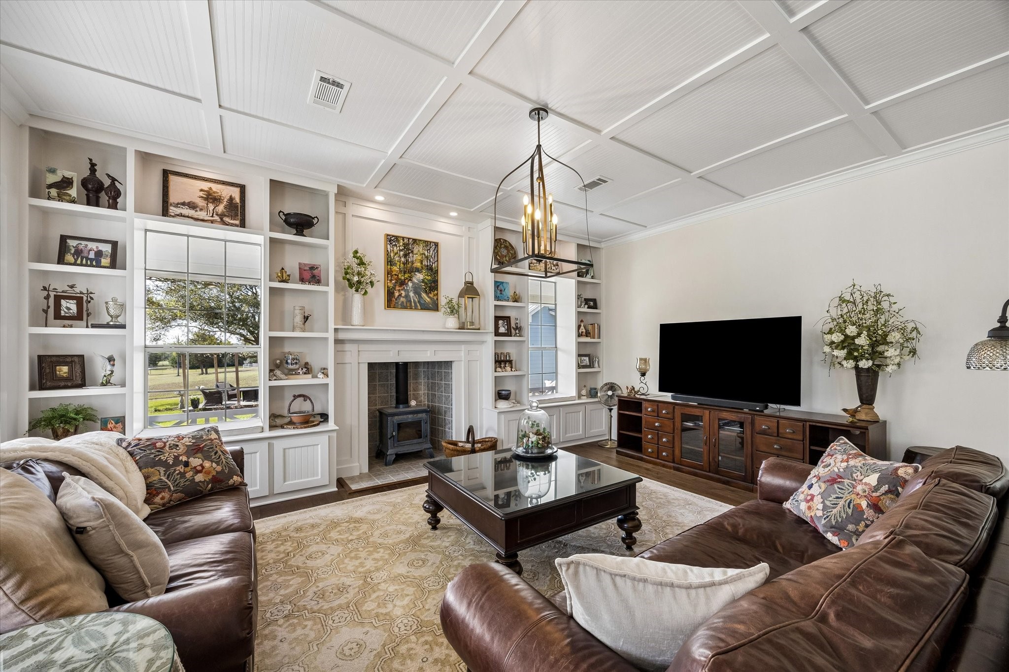10222 Old Stagecoach Road Chappell Hill, TX 77426 - Photo 7 of 42 a living room with furniture a fireplace and a flat screen tv