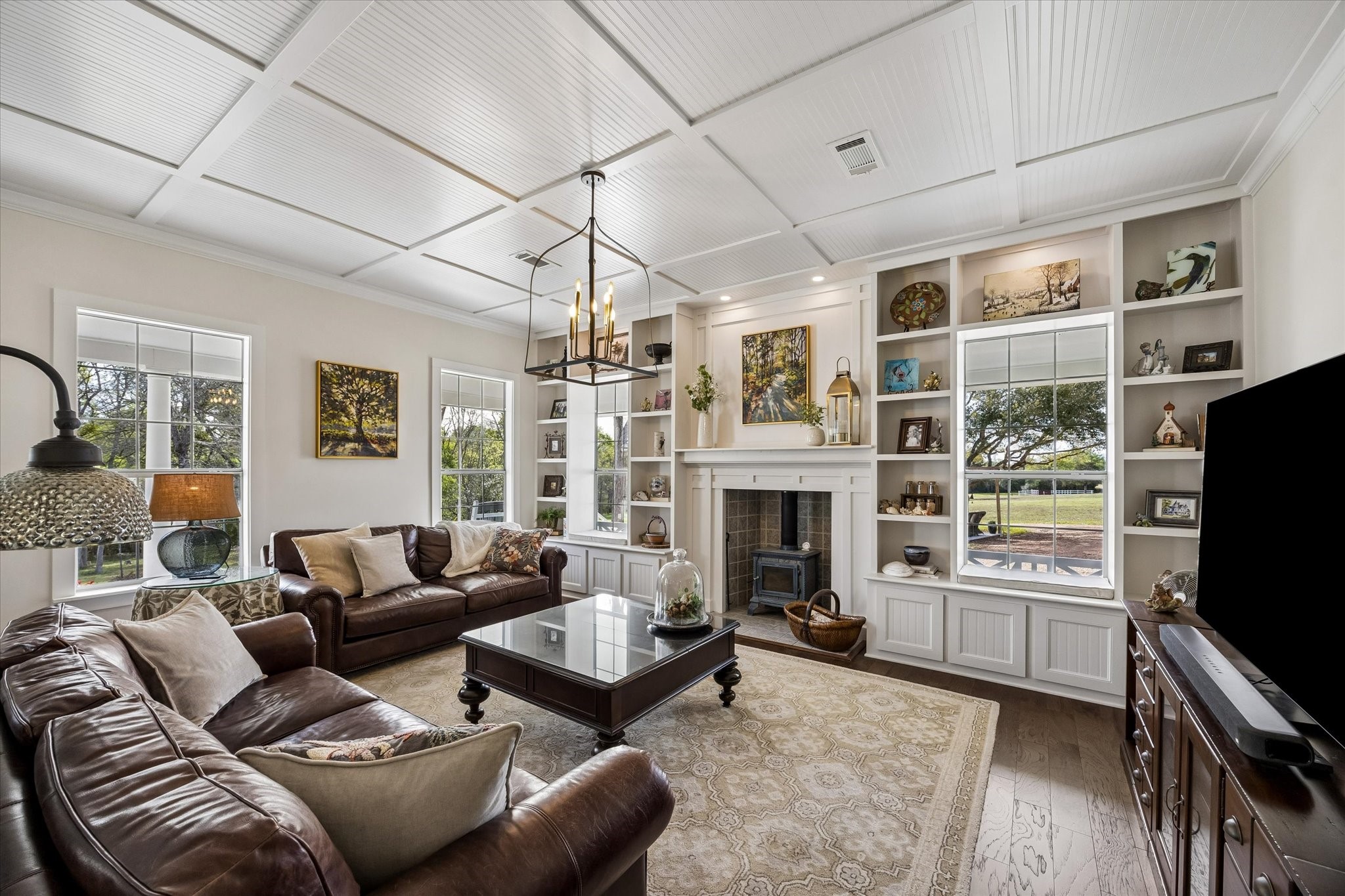 10222 Old Stagecoach Road Chappell Hill, TX 77426 - Photo 8 of 42 a living room with furniture a fireplace and a flat screen tv
