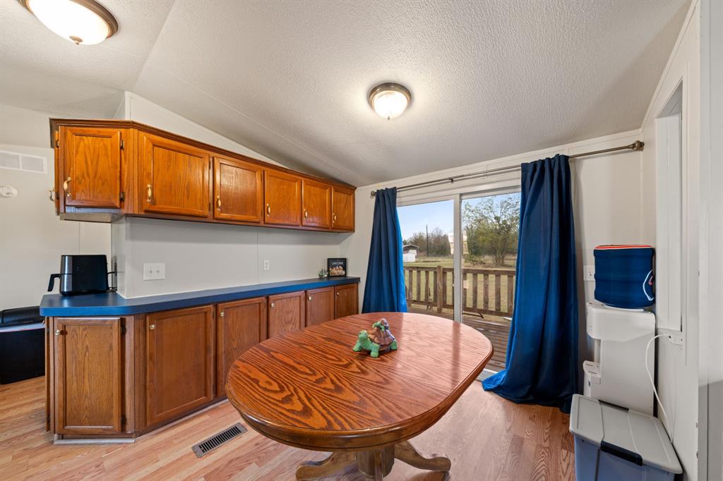 1304 Rains County Road 1530 Point, TX 75472 - Photo 13 of 40 a view of a living room and a wooden floor