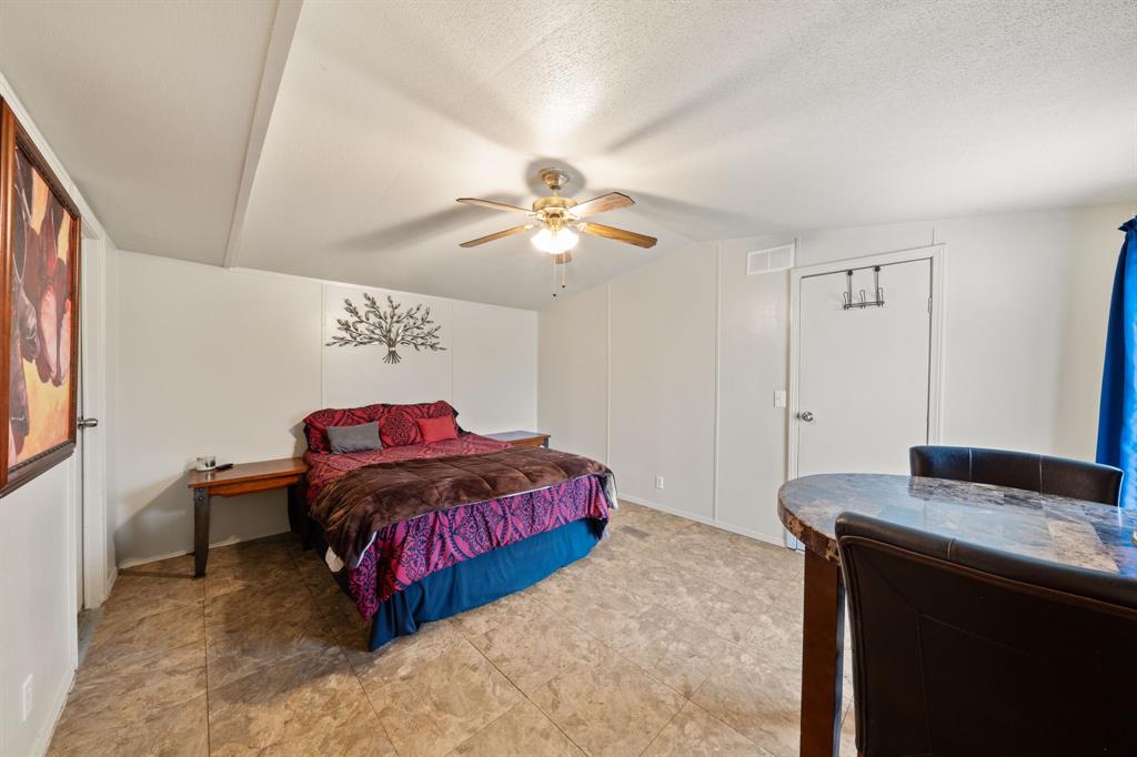 1304 Rains County Road 1530 Point, TX 75472 - Photo 16 of 40 a living room with furniture and a ceiling fan