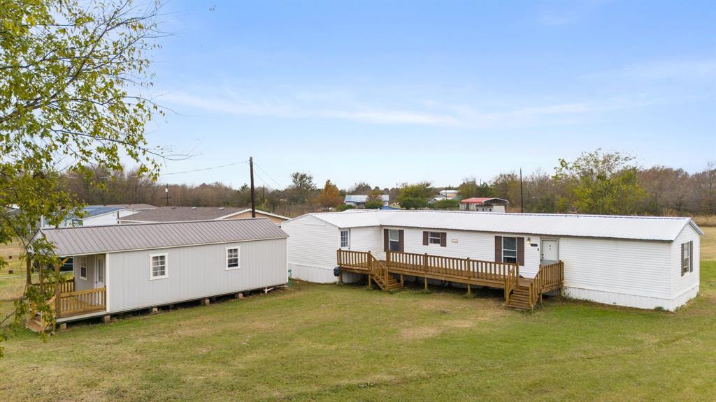 1304 Rains County Road 1530 Point, TX 75472 - Photo 2 of 40 a view of a house with pool in front of it