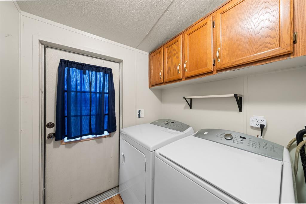 1304 Rains County Road 1530 Point, TX 75472 - Photo 24 of 40 a utility room with dryer and washer