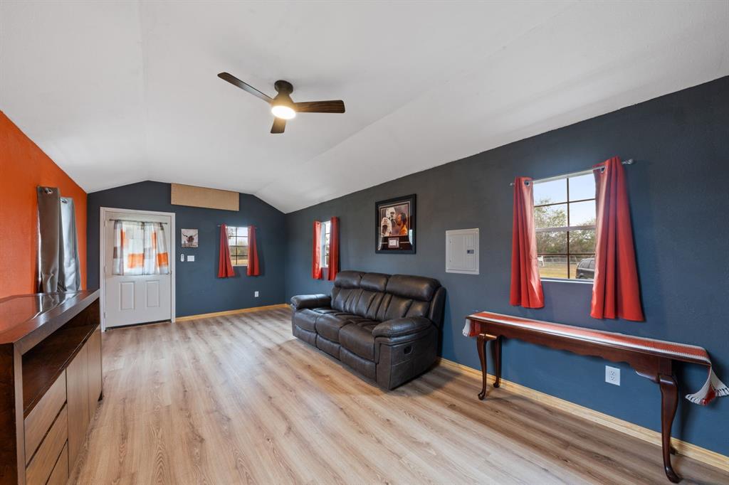 1304 Rains County Road 1530 Point, TX 75472 - Photo 28 of 40 a living room with furniture and a window