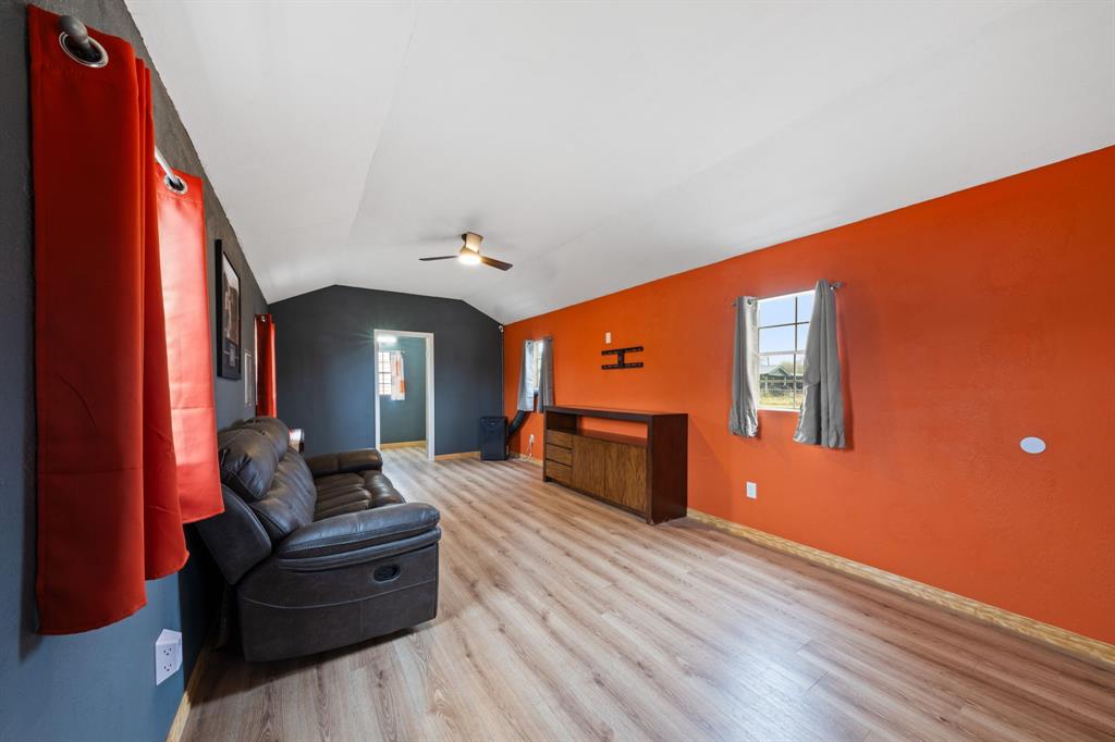 1304 Rains County Road 1530 Point, TX 75472 - Photo 31 of 40 a living room with furniture and a flat screen tv