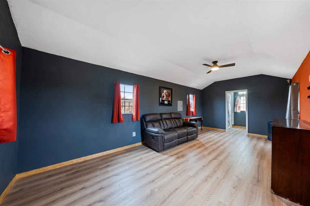 1304 Rains County Road 1530 Point, TX 75472 - Photo 32 of 40 a living room with furniture and a wooden floor