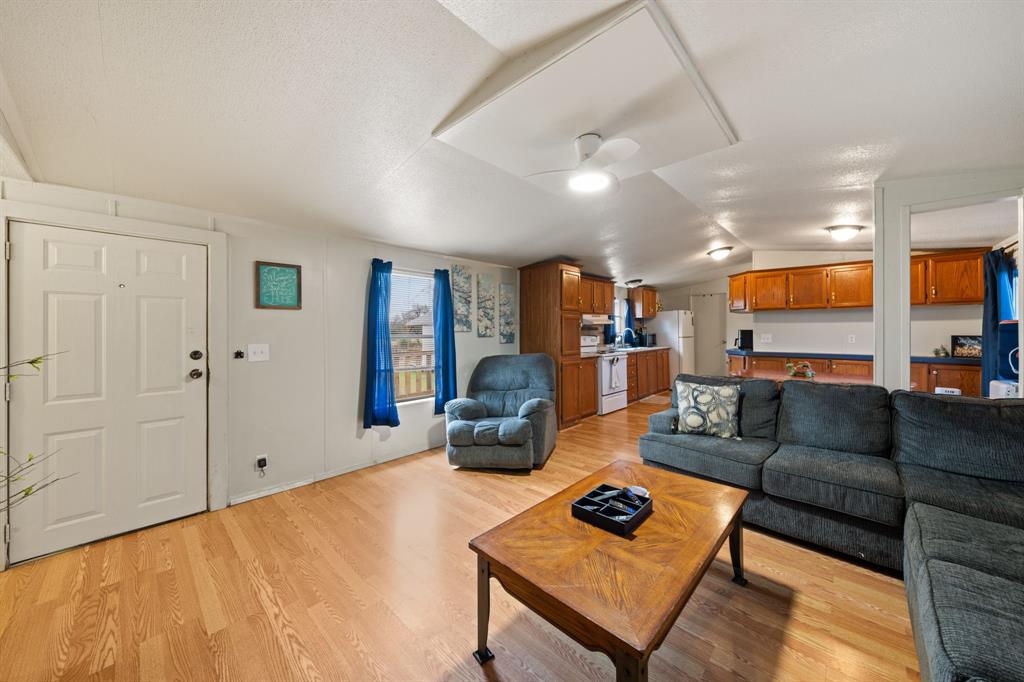 1304 Rains County Road 1530 Point, TX 75472 - Photo 6 of 40 a living room with furniture and a wooden floor