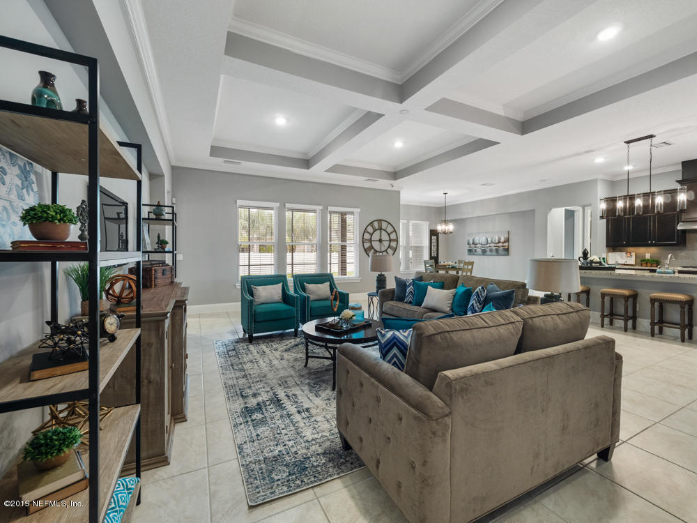 743 Cross Ridge Drive Ponte Vedra, FL 32081 - Photo 24 of 83 a living room with furniture kitchen view and a large window