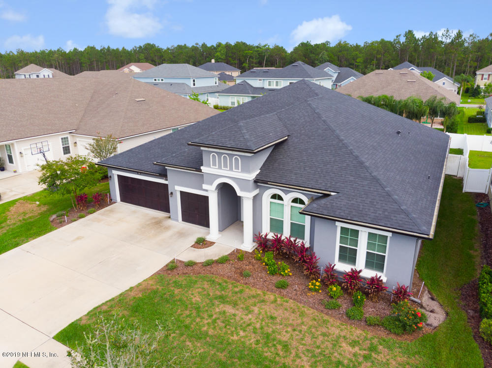 743 Cross Ridge Drive Ponte Vedra, FL 32081 - Photo 3 of 83 a aerial view of a house with a yard