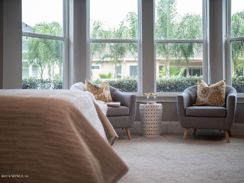 743 Cross Ridge Drive Ponte Vedra, FL 32081 - Photo 35 of 83 a bedroom with furniture and a large window