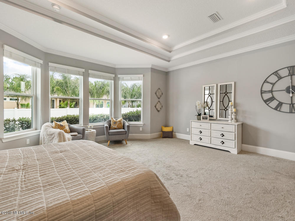 743 Cross Ridge Drive Ponte Vedra, FL 32081 - Photo 39 of 83 a bed room with a bed and a large window