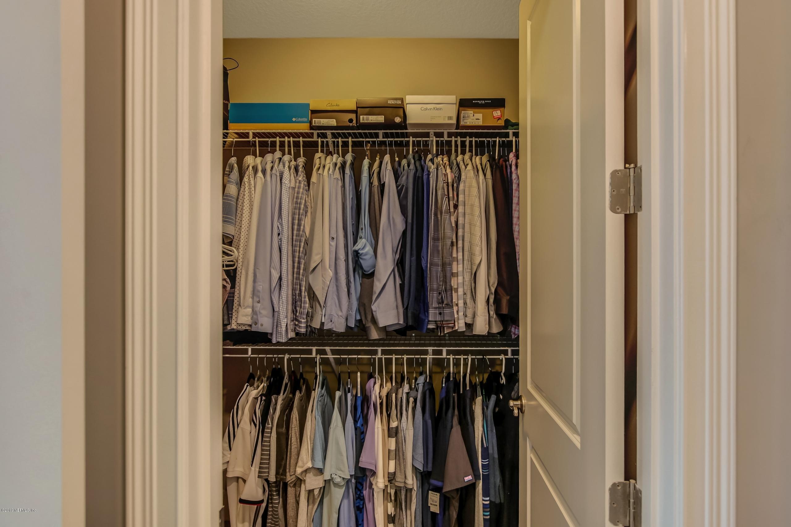 743 Cross Ridge Drive Ponte Vedra, FL 32081 - Photo 41 of 83 a view of walk in closet with clothes