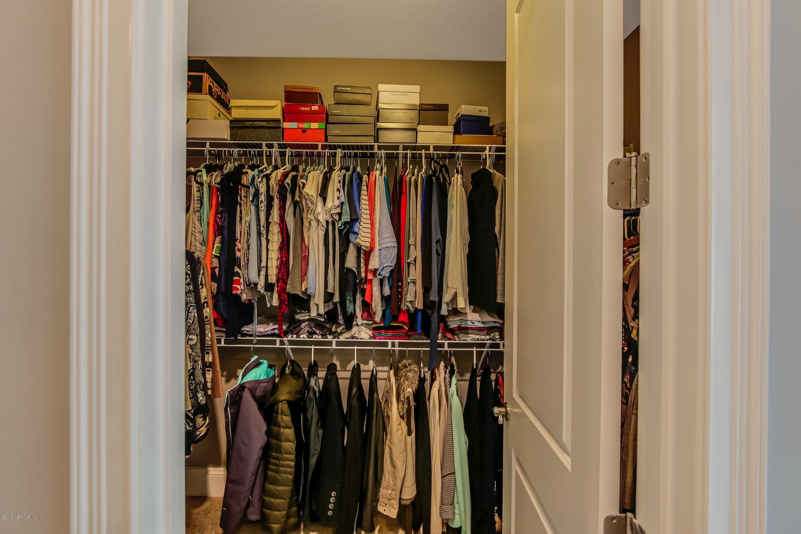 743 Cross Ridge Drive Ponte Vedra, FL 32081 - Photo 42 of 83 a view of walk in closet with clothes