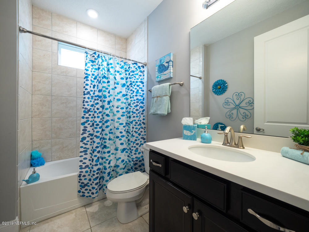 743 Cross Ridge Drive Ponte Vedra, FL 32081 - Photo 46 of 83 a bathroom with a sink a toilet and shower