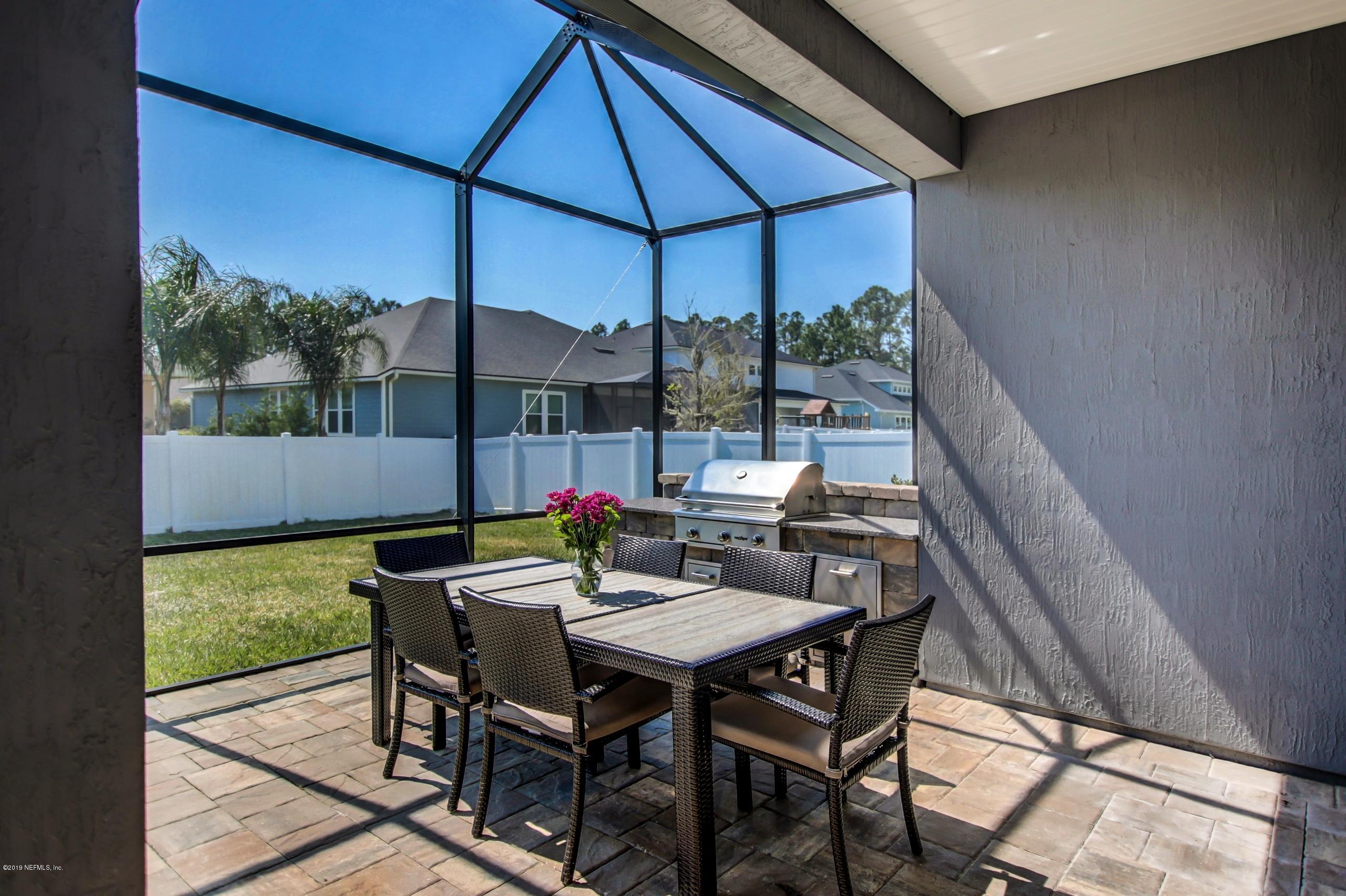 743 Cross Ridge Drive Ponte Vedra, FL 32081 - Photo 60 of 83 a view of an outdoor sitting area with furniture and backyard