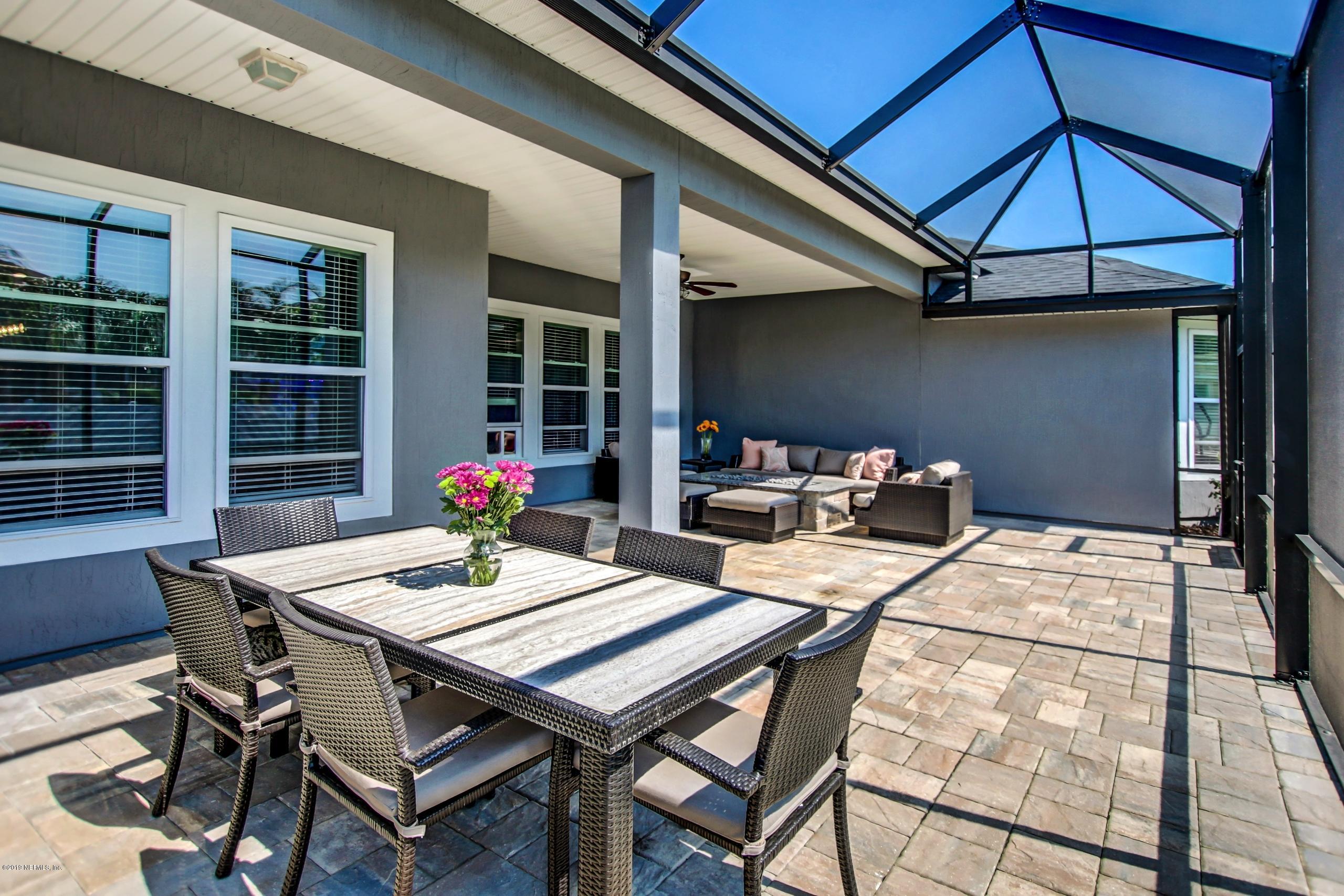 743 Cross Ridge Drive Ponte Vedra, FL 32081 - Photo 61 of 83 a view of a dining room with furniture and window