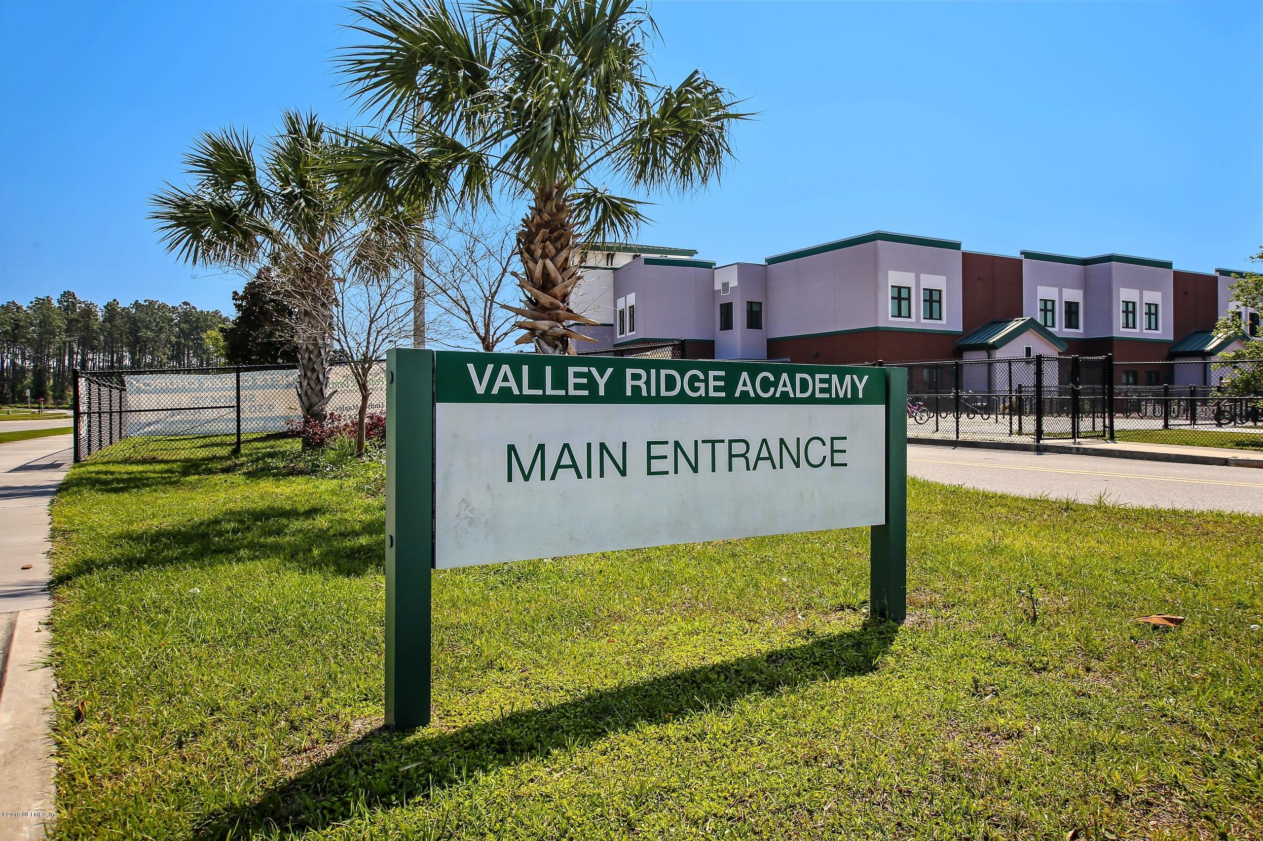 743 Cross Ridge Drive Ponte Vedra, FL 32081 - Photo 68 of 83 a sign on the side of the building