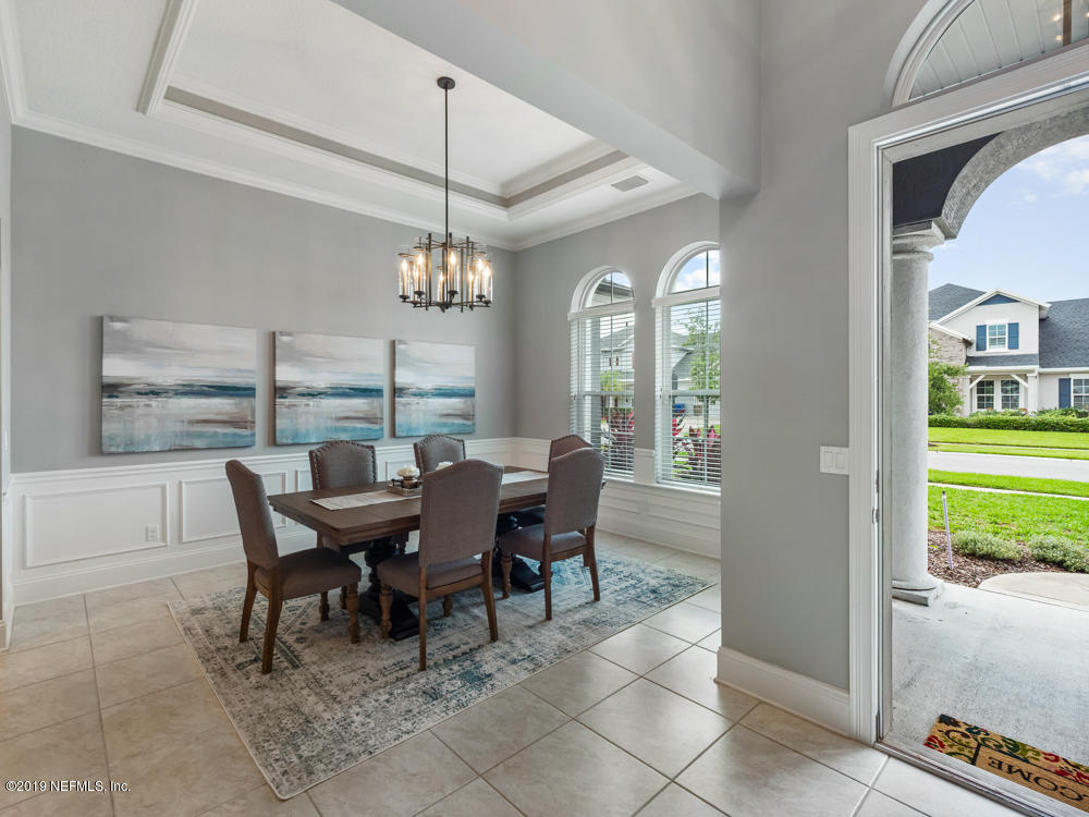 743 Cross Ridge Drive Ponte Vedra, FL 32081 - Photo 8 of 83 a view of a dining room with furniture window and outside view