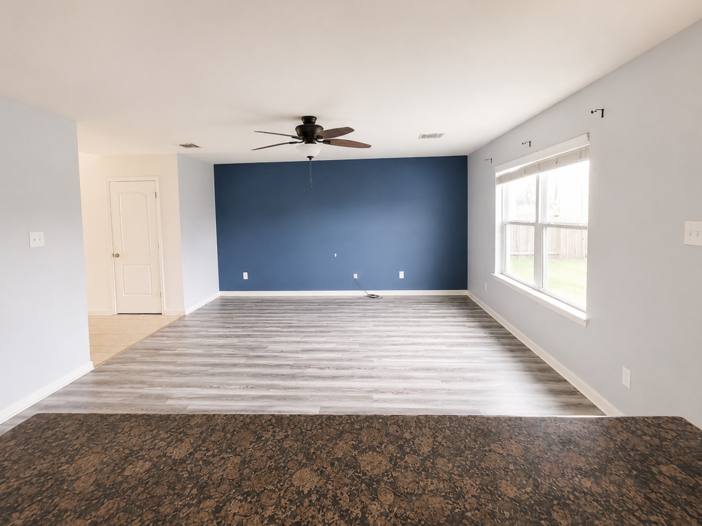 341 Comanche Plains Road La Marque, TX 77568 - Photo 6 of 17 a view of an empty room with a window