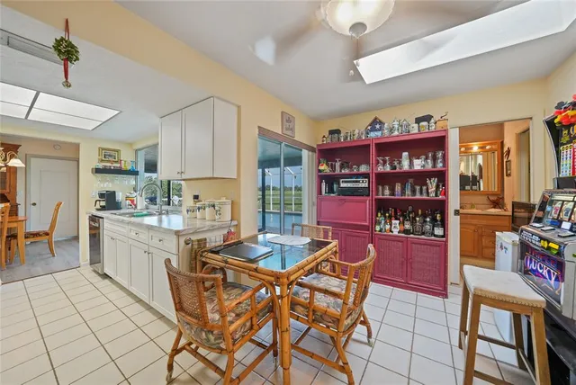 a view of a dining room kitchen and a window
