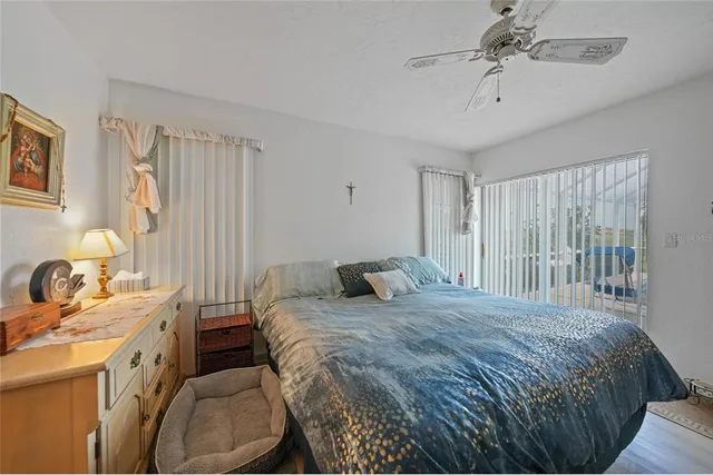 a bathroom with a sink mirror vanity and toilet