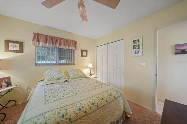 a bathroom with a tub a sink and mirror