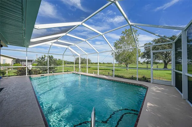 a view of yard with patio