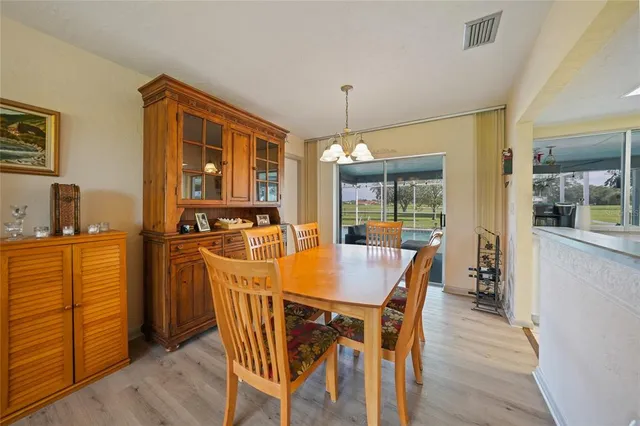 a kitchen with a sink a stove and refrigerator