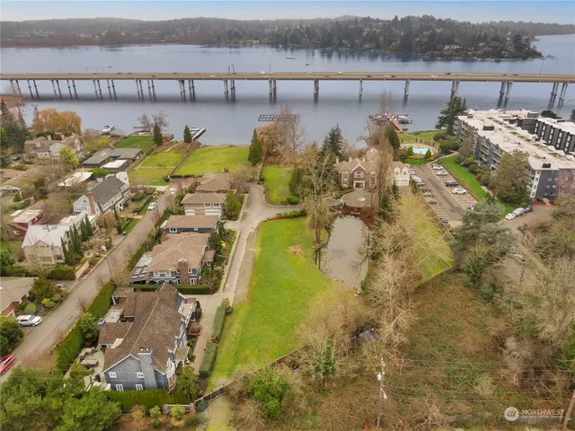 a view of a lake with a building in the background